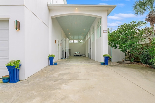 view of home's exterior featuring a garage and stucco siding