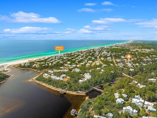 bird's eye view featuring a water view and a view of the beach