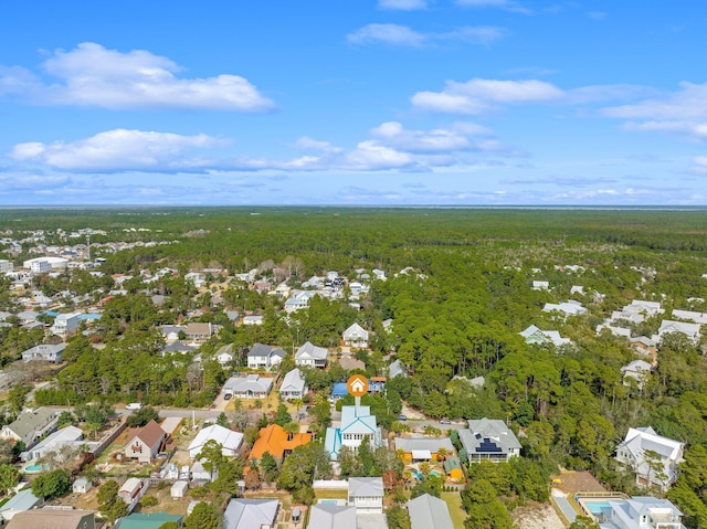 aerial view featuring a residential view and a view of trees