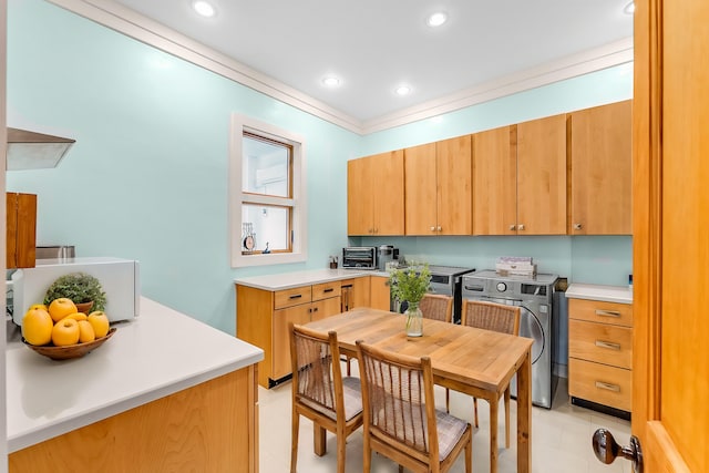 kitchen with light countertops, ornamental molding, recessed lighting, and a toaster