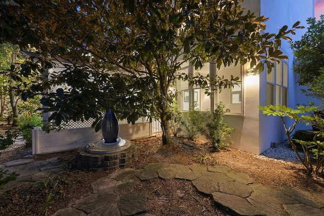 exterior space featuring stucco siding