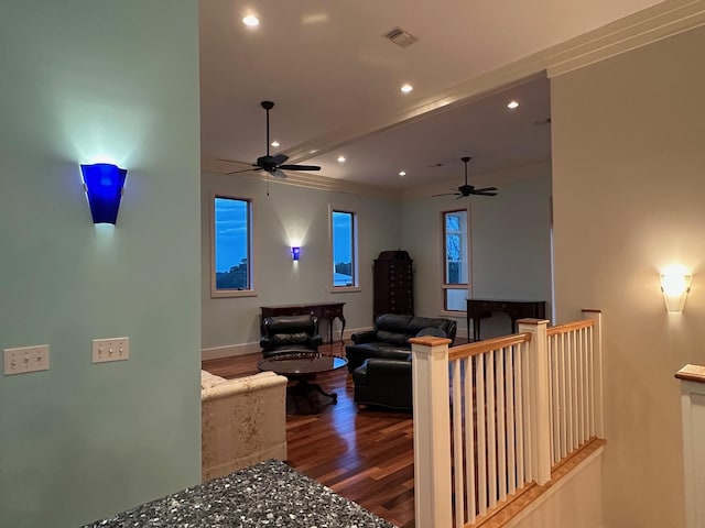 living room featuring recessed lighting, wood finished floors, a ceiling fan, visible vents, and baseboards