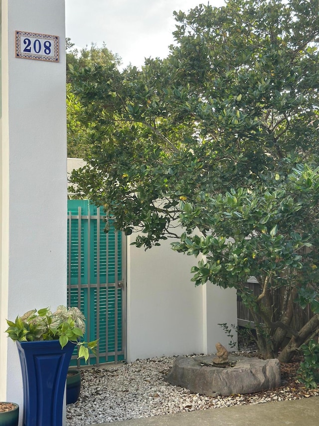 view of side of property with stucco siding