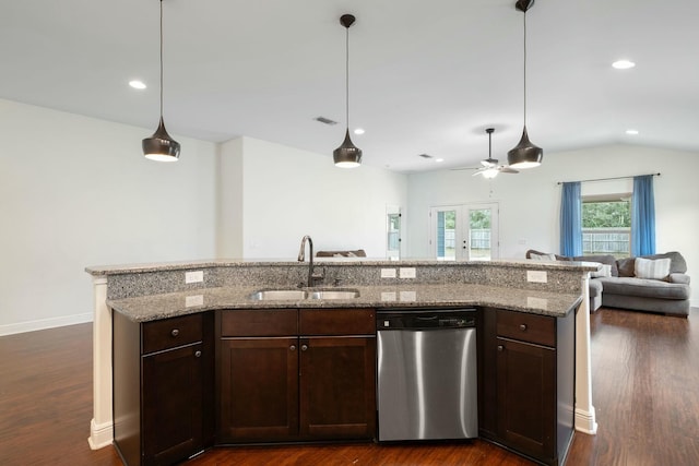 kitchen with stainless steel dishwasher, dark hardwood / wood-style flooring, sink, and dark brown cabinets