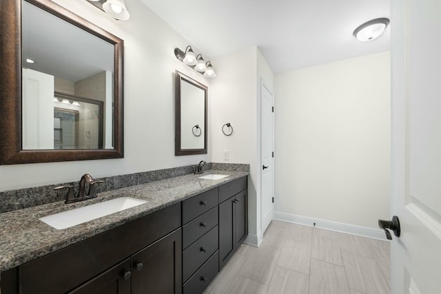 bathroom featuring vanity and walk in shower