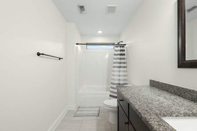 full bathroom with tile patterned floors, vanity, toilet, and shower / tub combo with curtain