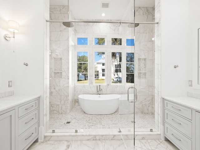 59 Arboleda Dr, Santa Rosa Beach, FL 32459 - bathroom with a marble finish shower, visible vents, a soaking tub, marble finish floor, and vanity