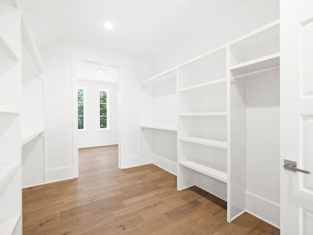 59 Arboleda Dr, Santa Rosa Beach, FL 32459 - walk in closet featuring wood finished floors