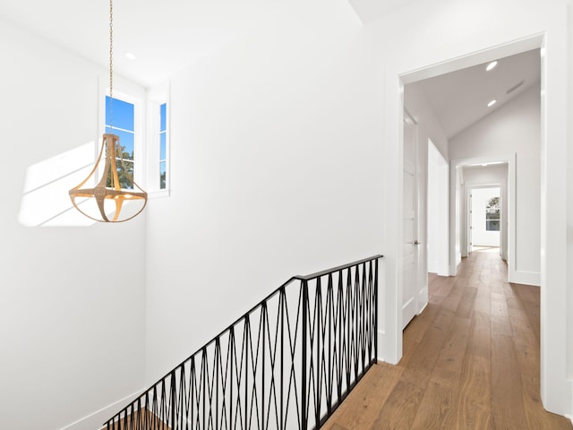 59 Arboleda Dr, Santa Rosa Beach, FL 32459 - hallway with baseboards, wood finished floors, lofted ceiling, and recessed lighting