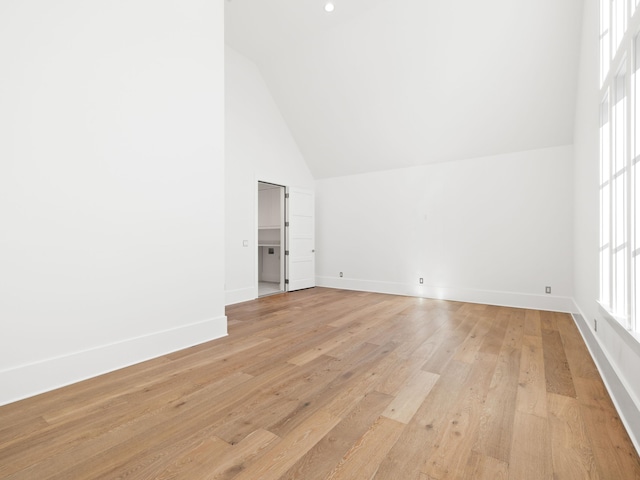59 Arboleda Dr, Santa Rosa Beach, FL 32459 - interior space with light wood-style flooring, high vaulted ceiling, and baseboards