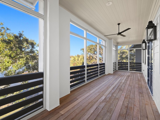 59 Arboleda Dr, Santa Rosa Beach, FL 32459 - unfurnished sunroom with wooden ceiling and ceiling fan