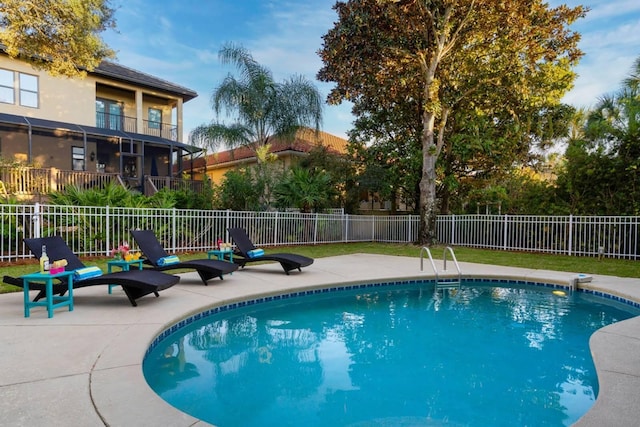 view of pool with a patio