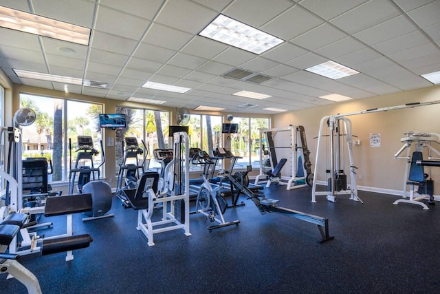 gym featuring a drop ceiling