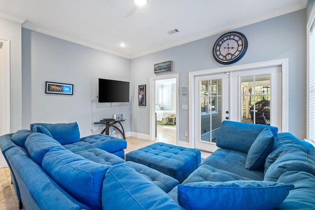 living area with baseboards, visible vents, crown molding, french doors, and recessed lighting