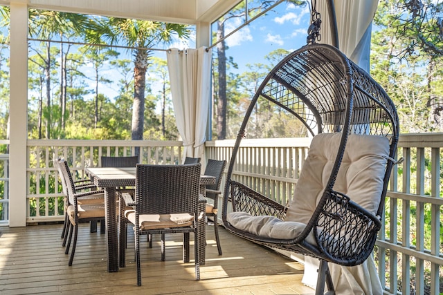 sunroom with plenty of natural light