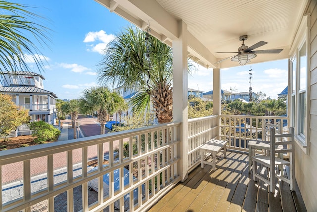 balcony featuring ceiling fan