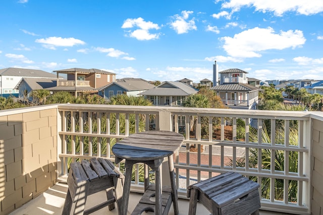 balcony featuring a residential view