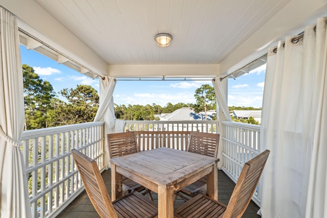 balcony featuring a sunroom