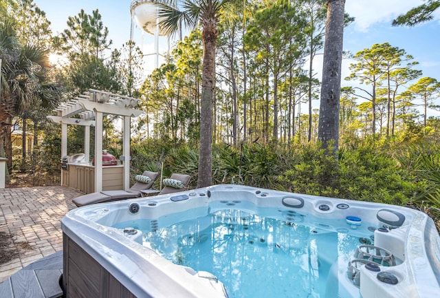 view of pool with a patio area and a pergola