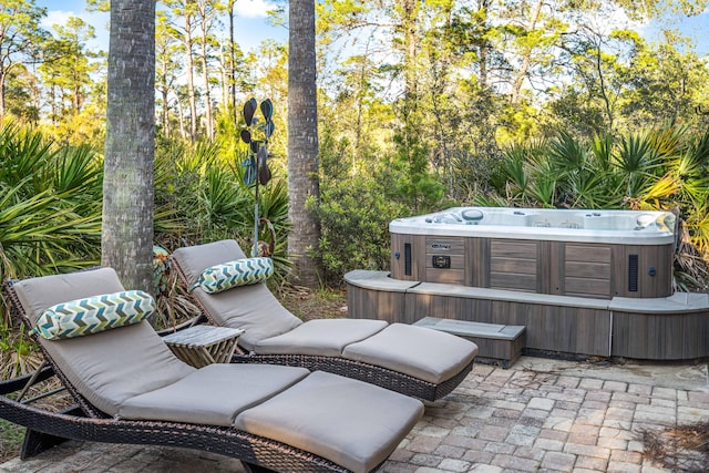 view of patio / terrace featuring a hot tub