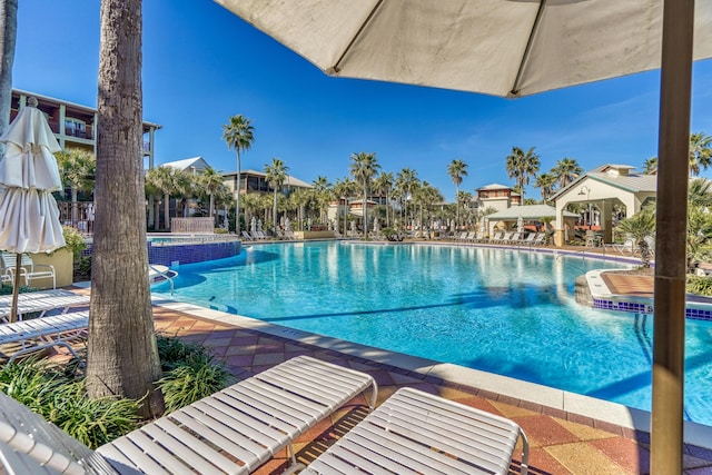 community pool with a patio