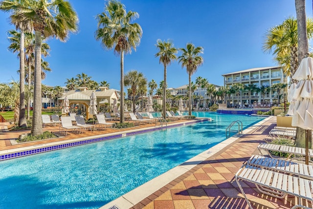 pool featuring a gazebo and a patio area