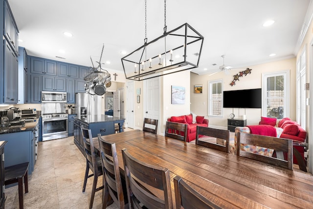 dining area with a toaster, visible vents, ceiling fan, ornamental molding, and recessed lighting