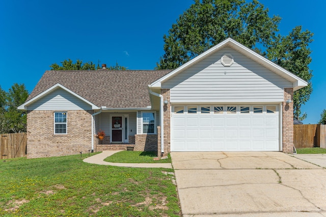 ranch-style home with a garage and a front yard