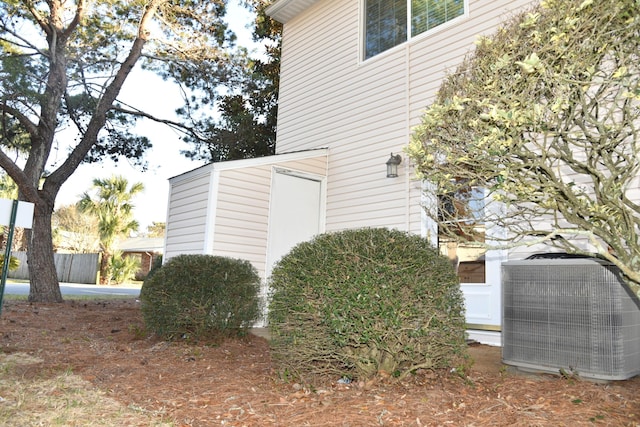 view of property exterior featuring central AC