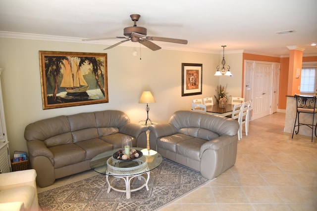 living room with ceiling fan, ornamental molding, and light tile patterned floors