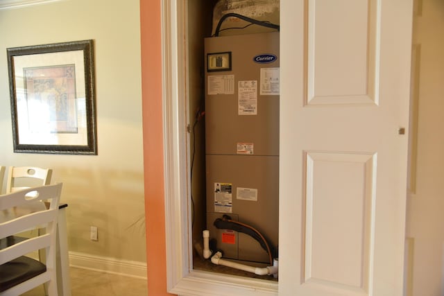 utility room featuring heating unit