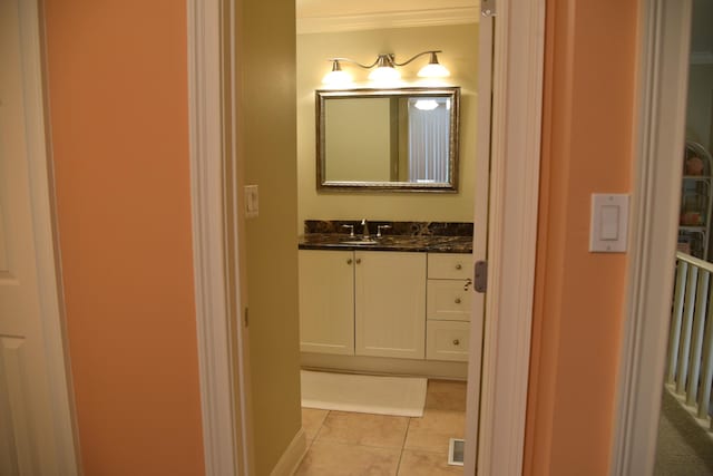 bathroom featuring tile patterned floors and vanity