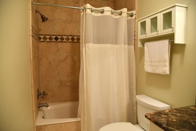 bathroom with shower / bath combination with curtain and toilet