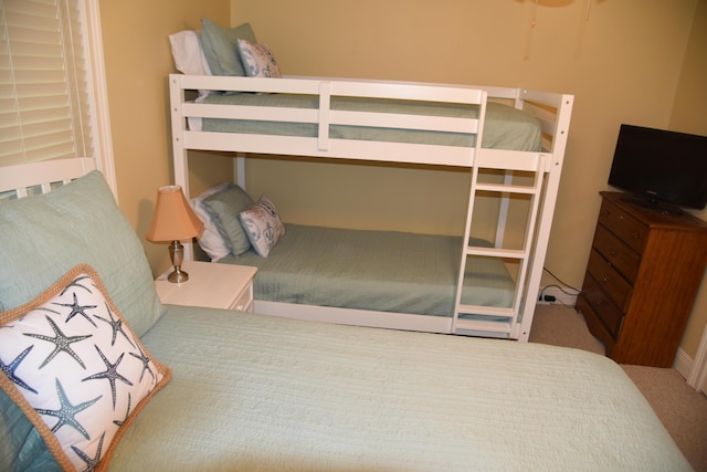 bedroom featuring carpet flooring