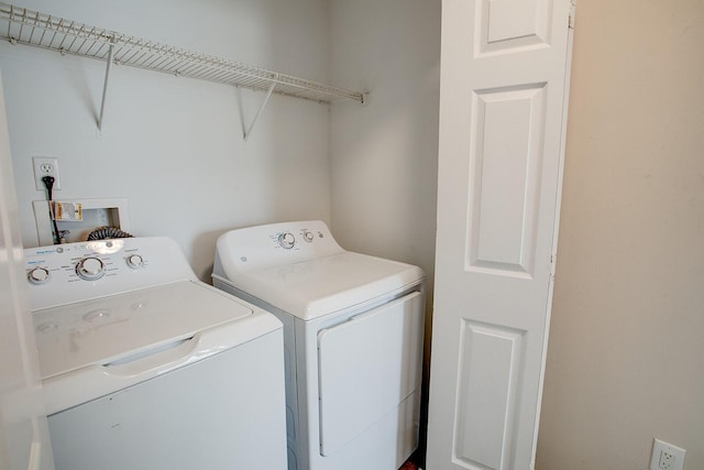 laundry area featuring washer and clothes dryer