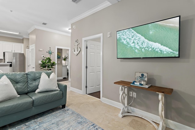 living room featuring baseboards, visible vents, and ornamental molding