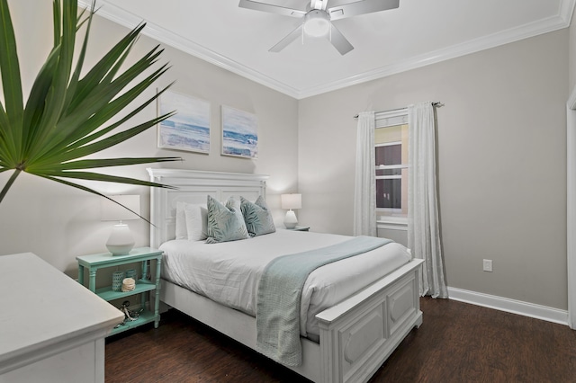 bedroom with ornamental molding, dark wood finished floors, a ceiling fan, and baseboards