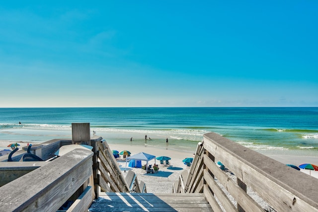 property view of water featuring a beach view