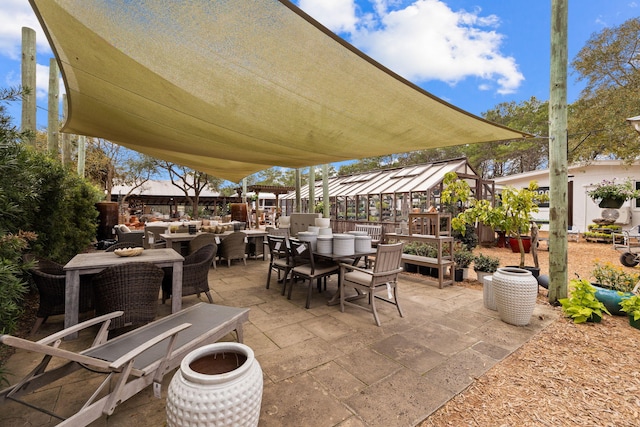 view of patio with outdoor dining area