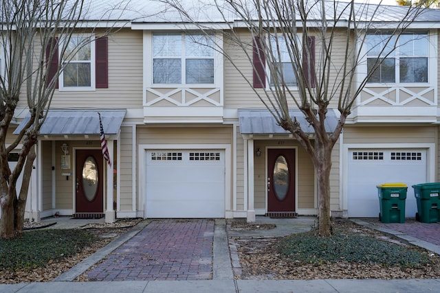 view of front of home with an attached garage and driveway