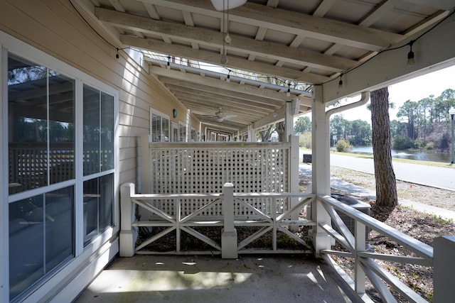 view of patio / terrace featuring ceiling fan