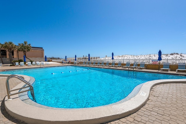 view of pool featuring a patio