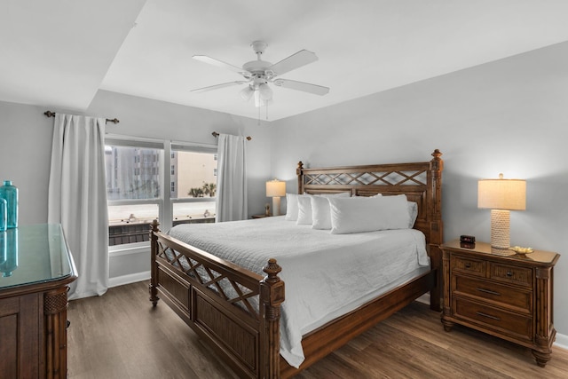 bedroom featuring ceiling fan and dark hardwood / wood-style flooring