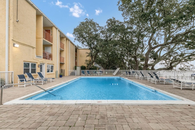 view of pool with a patio area