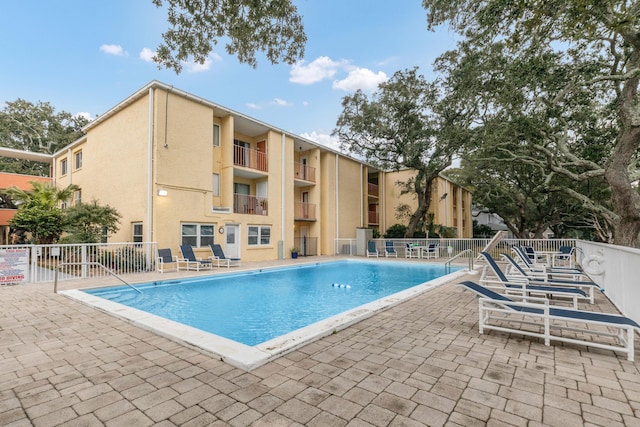 view of pool with a patio area