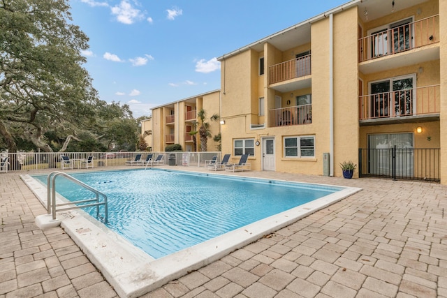 view of pool with a patio area