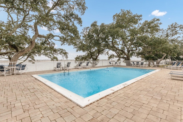 view of pool with a patio