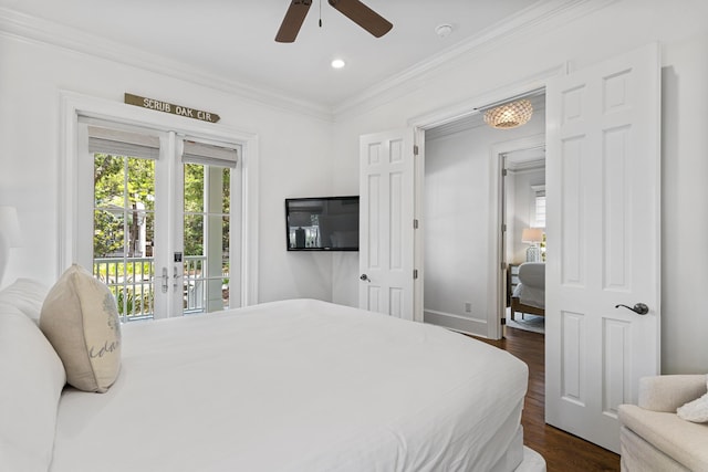 bedroom featuring french doors, ornamental molding, multiple windows, and access to outside