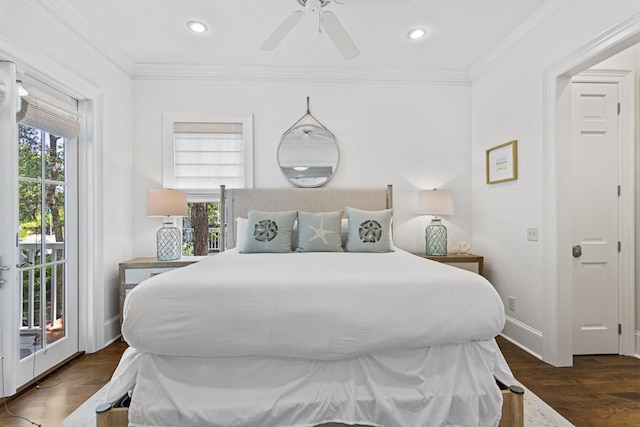 bedroom with crown molding, dark hardwood / wood-style floors, and access to exterior