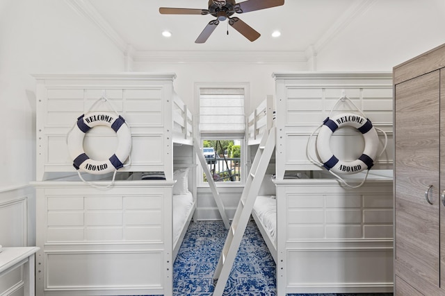 interior space featuring crown molding and ceiling fan